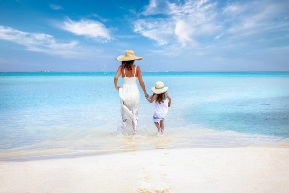 Discover stress-free family vacation tips! Learn how to find reliable childcare, hire local nannies, or bring your sitter along for a relaxing getaway.